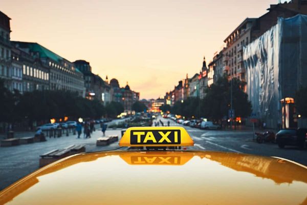 taxi-car-on-the-city-street-PW58UFA1200W